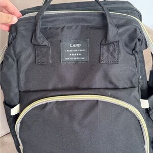 AND Black Backpack with Cream Accents